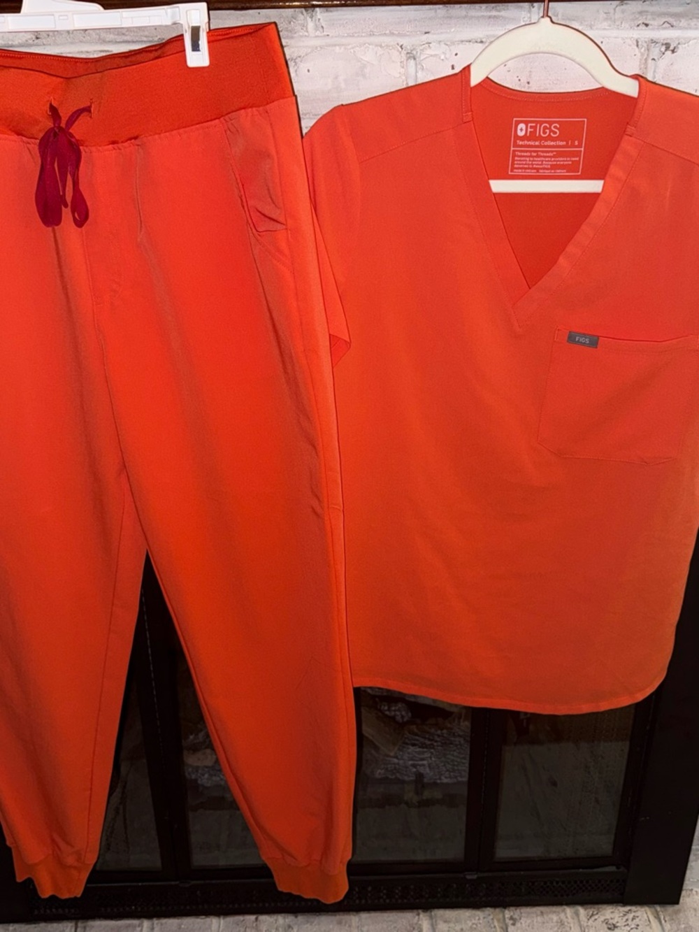 FIGS Women's Scrub Set in Bright Orange small top / medium regular pants